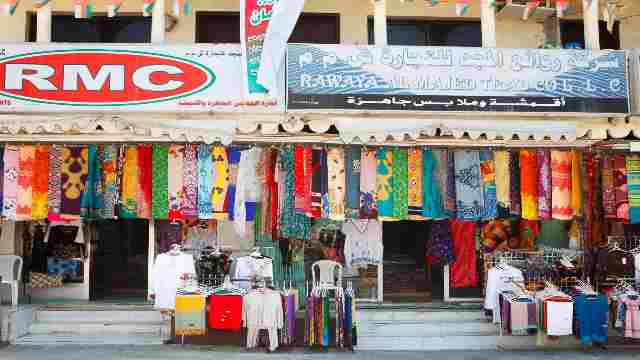 Salalah-Oman-Traditional-arabic-market-(souq)-in-the-centre-of-the-town-with-various-products-for-sale-fabrics-clothes-fragrances-frankincenses-souvenirs