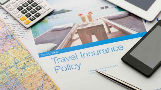 Travel-insurance-policy-document-with-paperwork