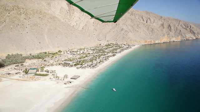Next travel destination Oman affordable vacation Planning Service and Company 16 View-from-a-hang-glider-adventure-sports-to-the-beach-in-Oman-Arabia-by-Travelstoyou-Oman
