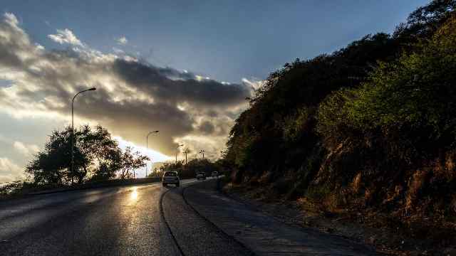 Next travel destination Oman affordable vacation Planning Service and Company 5 mountain-road-with-cloud-sky-during-sunset